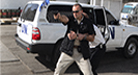 Protective operation beside a vehicle